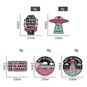 Set of 5 pastel Halloween enamel pins featuring ghosts, UFOs, and funny quote bubbles