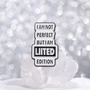 Minimalist alloy rectangular enamel brooch with motivational text on crystal prop