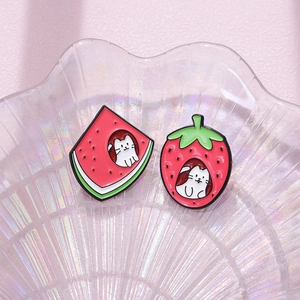 Creative enamel fruit pins featuring cute cats in watermelon and strawberry shapes