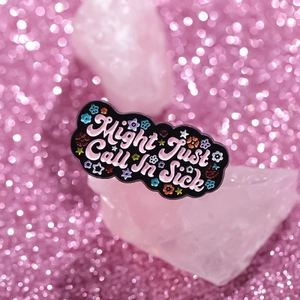 Black enamel cloud pin with Might Just Call In Sick text and colorful floral motifs