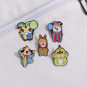 Detailed close-up of circus clown animal enamel pins on a white canvas bag