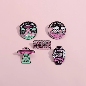 5-piece punk enamel pin set featuring UFO skulls and coffins on pink background
