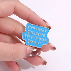 Blue enamel pin with gold wave edge and 'I'M ONLY TALKING TO MY DOG TODAY' quote