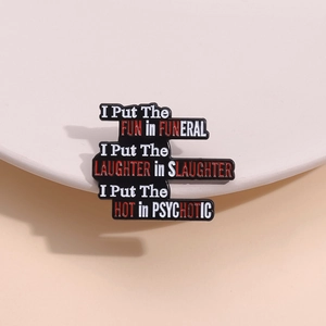 Funny dark humor enamel pin with sarcastic text and gothic aesthetic on a display stand