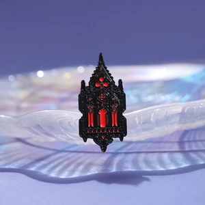 Gothic cathedral window enamel pin in red and black metal for clothes and bags