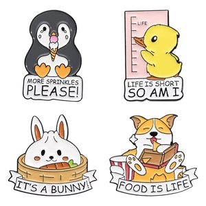 Set of 4 cute animal enamel pins featuring a penguin, duck, bunny, and corgi motifs