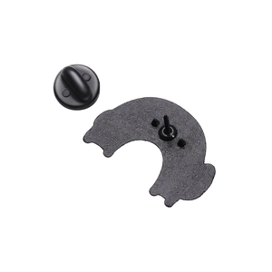 Detailed view of matte black enamel pin backing with a secure rubber butterfly clutch