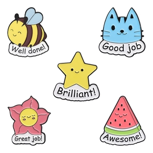 Five-piece set of cartoon enamel pins with bee, cat, and star motifs on white background