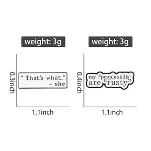 Detail view of two white enamel pins with dimensions and weight for product sizing