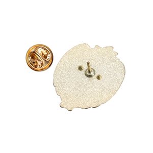 Detailed back view of gold enamel pin with butterfly clutch and anti-slip prongs