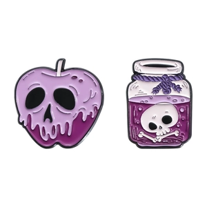 Halloween enamel pin set featuring poison apple skull and potion bottle designs