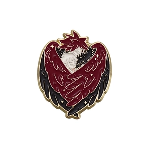Anime enamel brooch pin featuring cartoon characters with black wings and golden outlines
