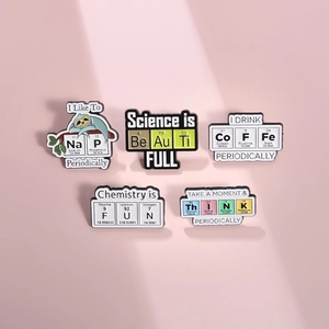 Set of five creative chemistry theme enamel pins featuring periodic table element symbols
