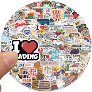 Close-up of waterproof reading stickers showing variety of colorful book-themed designs
