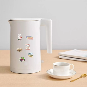 Waterproof reading-themed stickers with rabbit and frog motifs on a white bottle