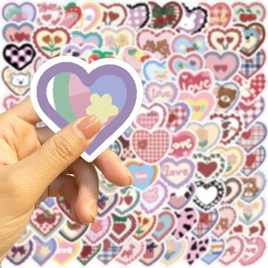 Set of 100 cute waterproof heart stickers featuring bears and floral designs for DIY