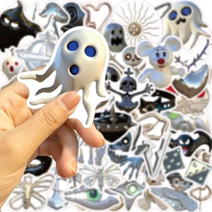 Detailed view of 3D embossed gothic skull and ghost stickers with a matte silver finish
