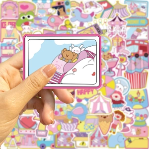 Close-up of cute amusement park stickers featuring bears and roller coasters