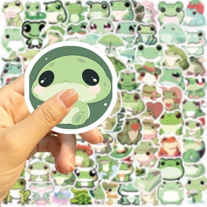 Close-up of waterproof cartoon frog stickers with various expressions for DIY decoration