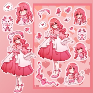 Detail of DIY stickers featuring cute anime girl characters in pink Lolita style fashion