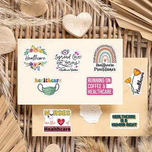 Flat lay of artistic healthcare vinyl stickers on a warm bohemian wooden background
