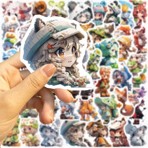 Close-up of a hand holding a pixel art anime girl sticker with animal theme outfit
