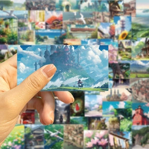 Close-up of waterproof anime landscape sticker with fantasy cloud castle illustration