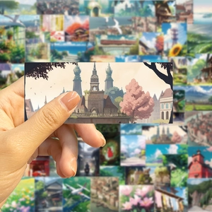 Close-up of waterproof cartoon landscape stickers being held to show size and matte texture