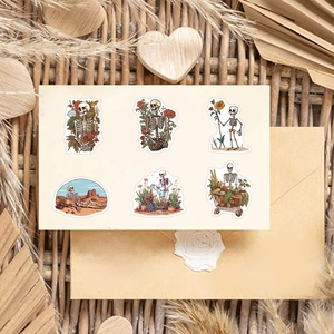 Retro skeleton doodle stickers with waterproof finish shown in a vintage stationery setting