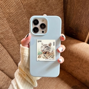 Close-up of light blue liquid silicone iPhone case with vintage Indian tiger stamp print