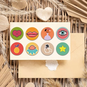 Detailed view of eight vintage-style cartoon stickers on a white card display