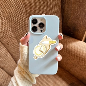 Detail of light blue iPhone case with cartoon cheese and kitchen knife stickers