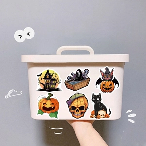 Waterproof Halloween graffiti stickers featuring ghosts and pumpkins on a white storage box