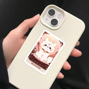 Detail of The Fool tarot sticker featuring a cute puppy on an off-white phone case