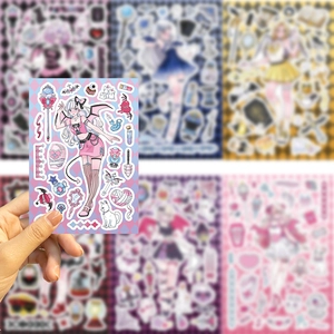 Detail of DIY stickers featuring anime girls, magic wands, and cats for journaling