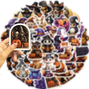 Close-up of assorted waterproof Halloween stickers featuring pumpkins, skulls and ghosts