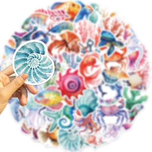 Hand holding a nautilus sticker from a 50pcs colorful sea animal waterproof set