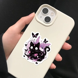 Close-up of a cartoon black cat sticker with purple wings applied to a smartphone case