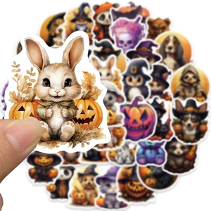 Waterproof cartoon Halloween animal stickers for guitars and laptops featuring cute pumpkins
