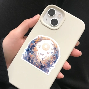 Artistic flower and moon butterfly sticker applied on a phone case back as decoration
