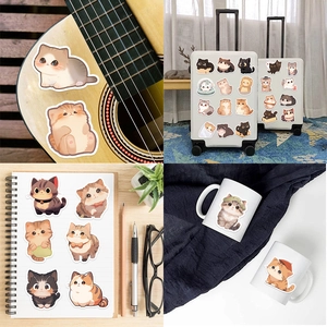 Cartoon round eye cat stickers applied to guitars, laptops, and travel suitcases