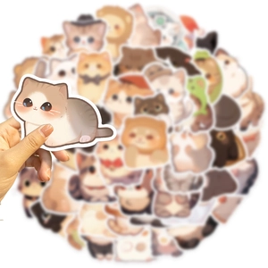 Hand holding cute cartoon cat sticker set for laptop guitar and luggage decoration