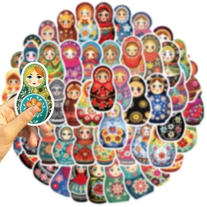Hand holding Matryoshka doll sticker, set of 52 colorful waterproof PVC graffiti decals