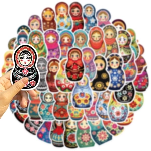 Close-up of a colorful Russian nesting doll sticker with diverse blurred background