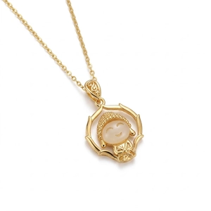 Cartoon Buddha pendant necklace in gold finish with white stone inlay on an O-chain