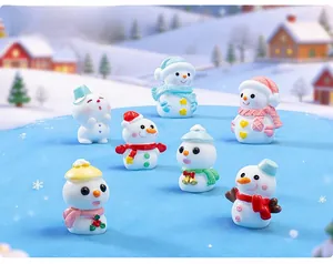 Detailed set of seven miniature resin snowmen with colorful hats for DIY winter landscapes