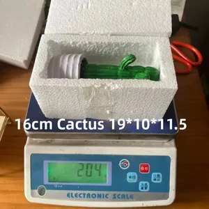 Detail showing artificial cactus ornament height of 16cm and weight of 204g