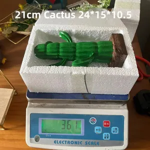 Detailed scale view of a 21cm green resin cactus decor weighing 361g on a wooden desk