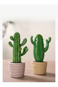 Macro view of two Nordic resin cactus plants with detailed textures and colorful mini pots