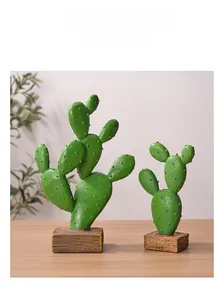 Detail of creative resin cactus plants with realistic texture and brown square bases
